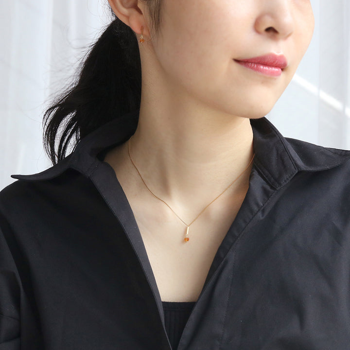 Signature ピアス スぺサルタイトガーネット
